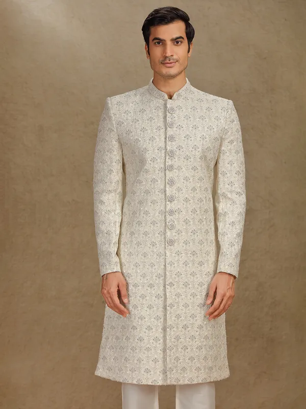 Elegant cream silk sherwani for grand weddings