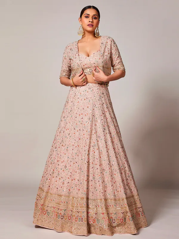 Elegant peach jacket style lehenga choli