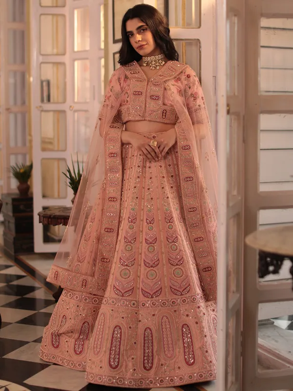 Elegant peach lehenga choli in raw silk