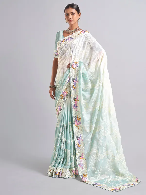 Elegant white and mint blue saree