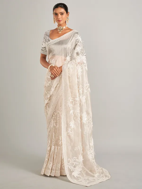 Elegantry off white silk saree with unstitched blouse