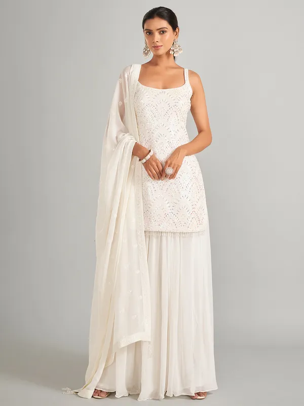 Enchanting georgette white palazzo salwar suit
