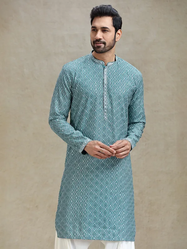 English green serene kurta set in symmetrical embroidery