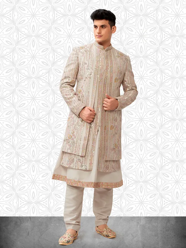Ethereal cream grooms sherwani in terry rayon