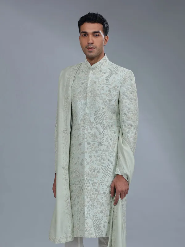 Fabulous light green raw silk sherwani for groom