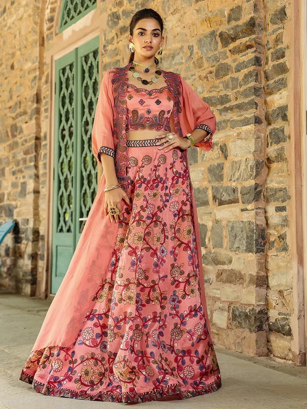 Fascinating silk peach lehenga choli with shrug