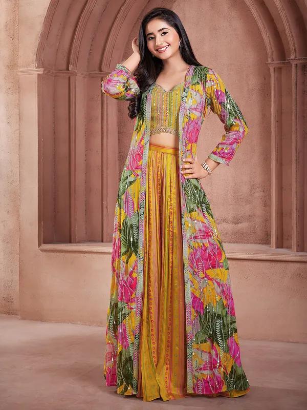 Fascinating yellow silk salwar suit with shrug