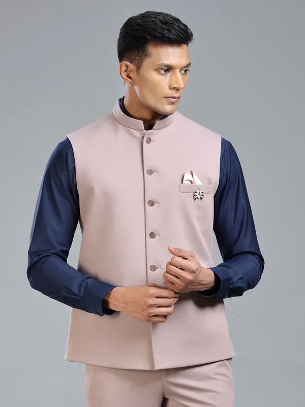 Festive fresh look with peach waistcoat for men