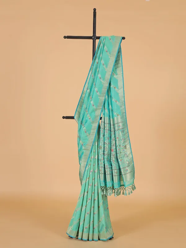 Festive style aqua silk saree