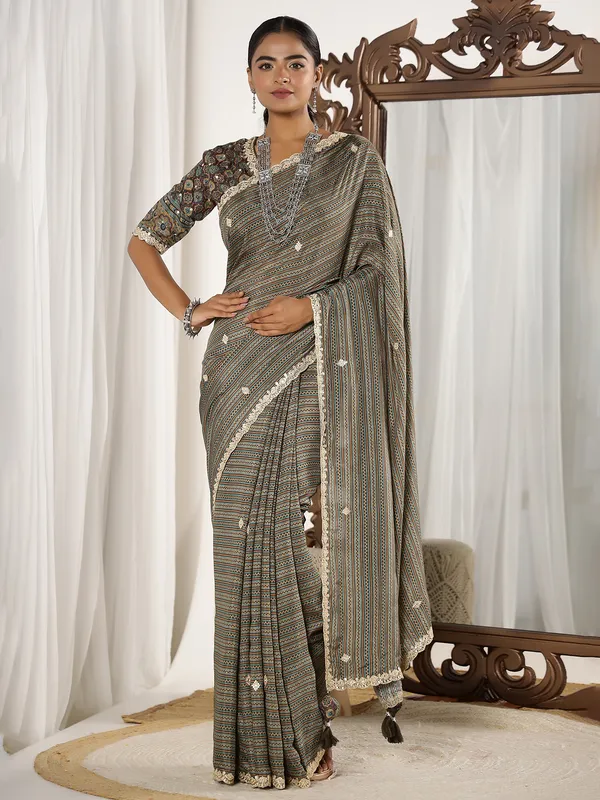 Festive style brown muslin saree