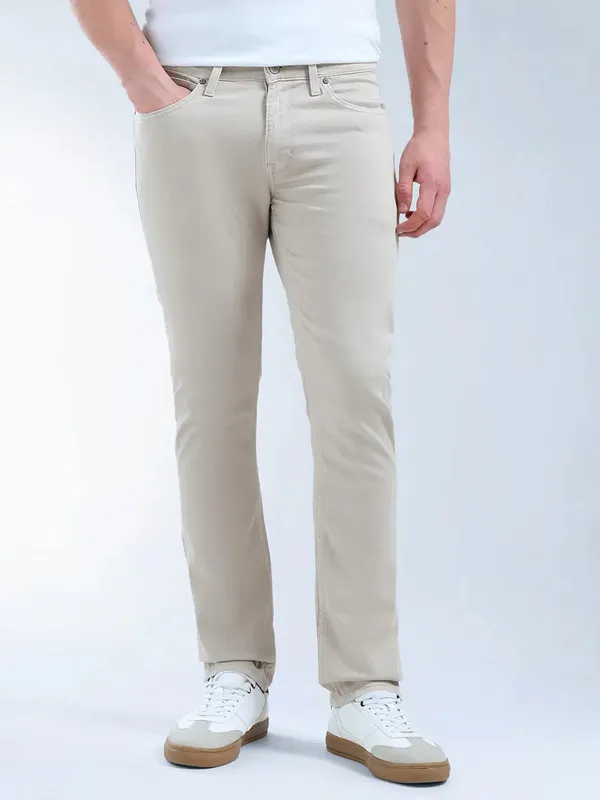 FLYING MACHINE solid beige slim fit denim for men