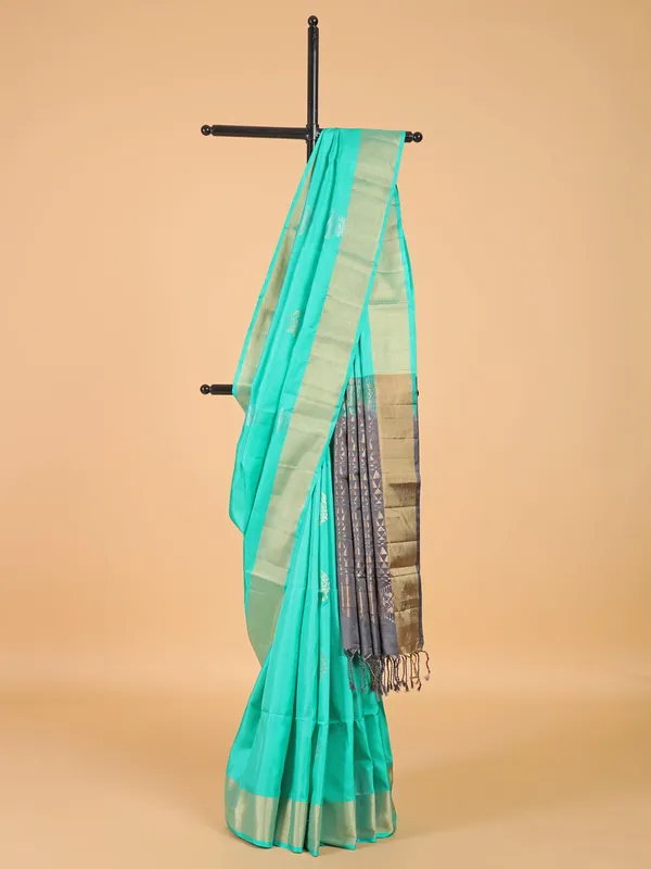 Fresh aqua silk saree for festive look