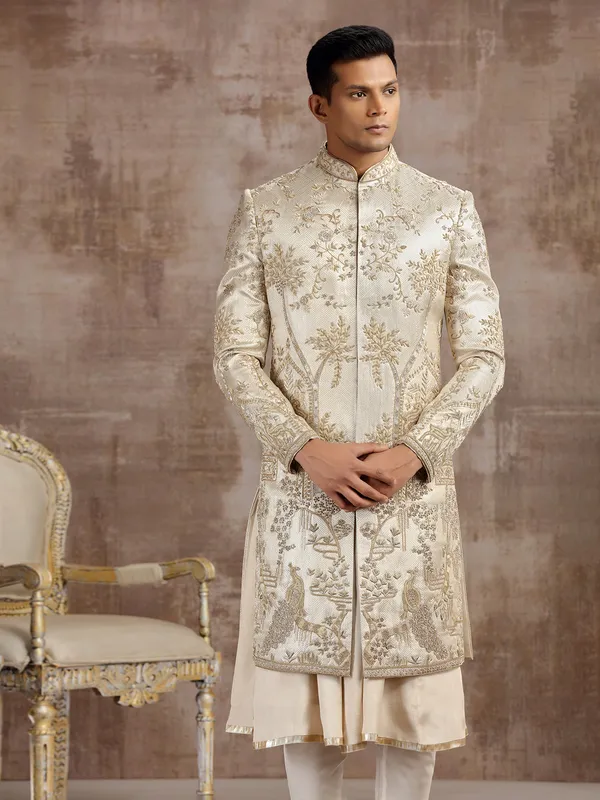 Gold silk peshwai sherwani with classic craftsmanship