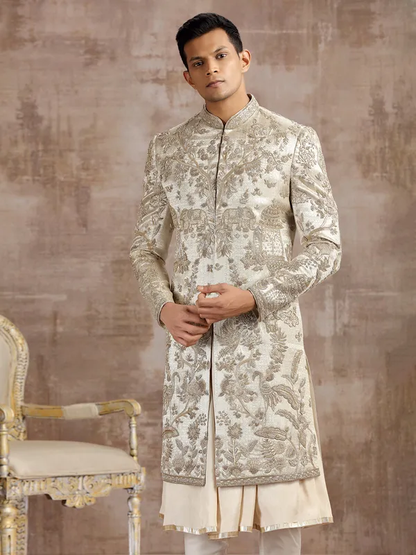 Gold silk peshwai sherwani with diamond embellishments