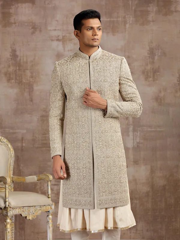 Gold silk peshwai sherwani with subtle shine