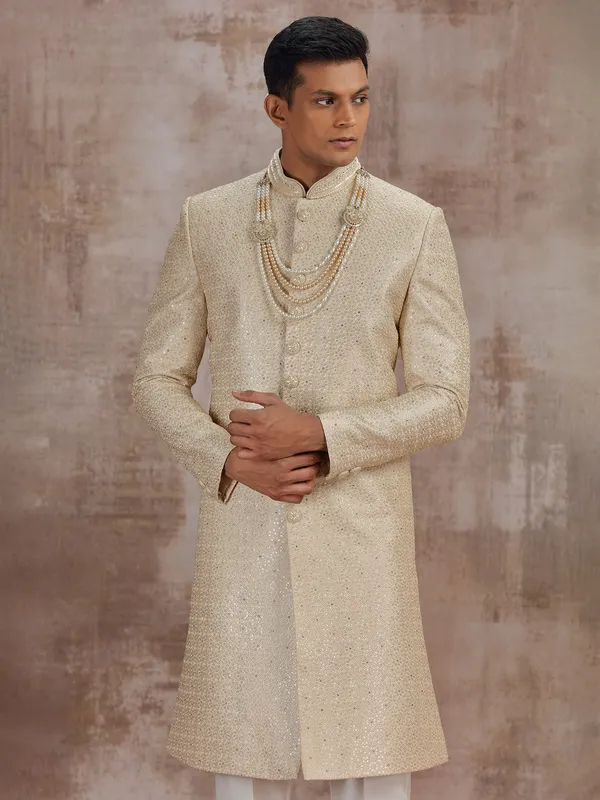 Gold silk wedding sherwani for groom