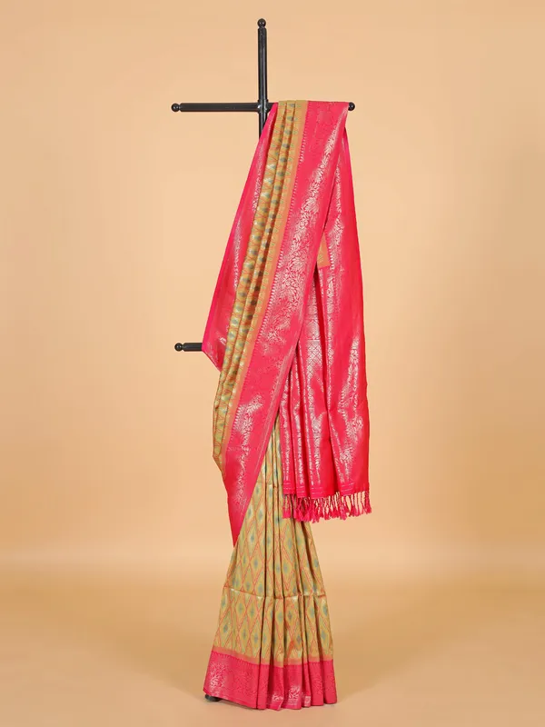 Golden silk saree with attractive pink pallu