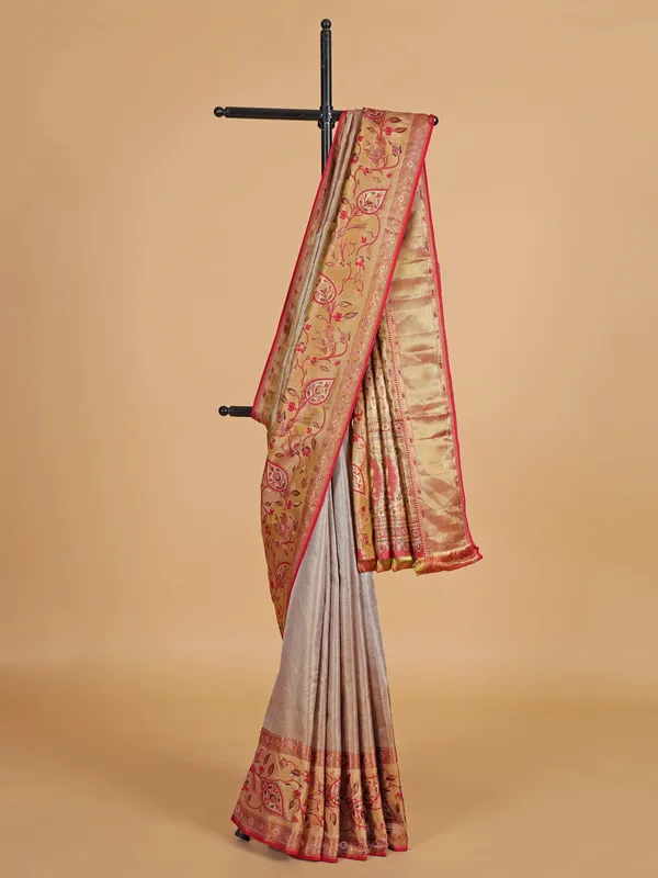 Golden silk saree with rich zari weaving