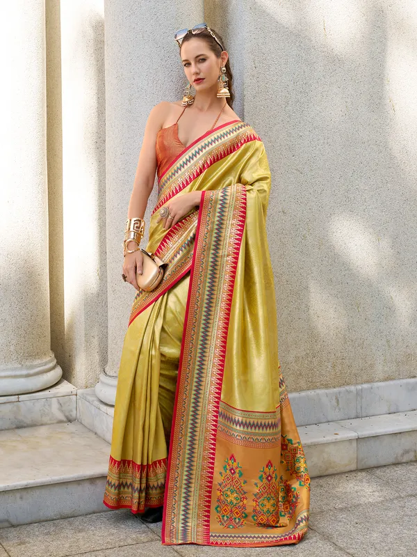 Golden tissue silk saree with zari weaving