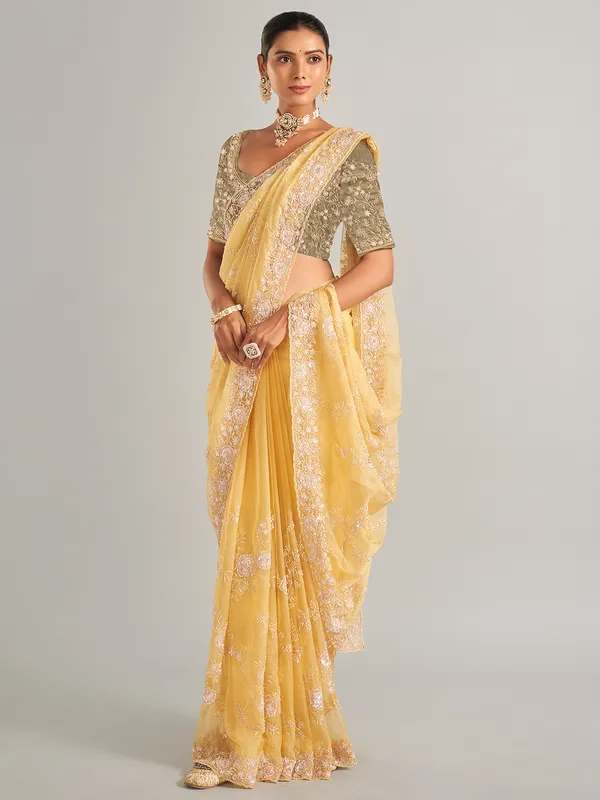 Gorgeous light yellow organza silk saree