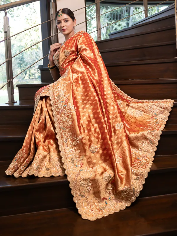 Gorgeous orange saree in banarsi tissue silk