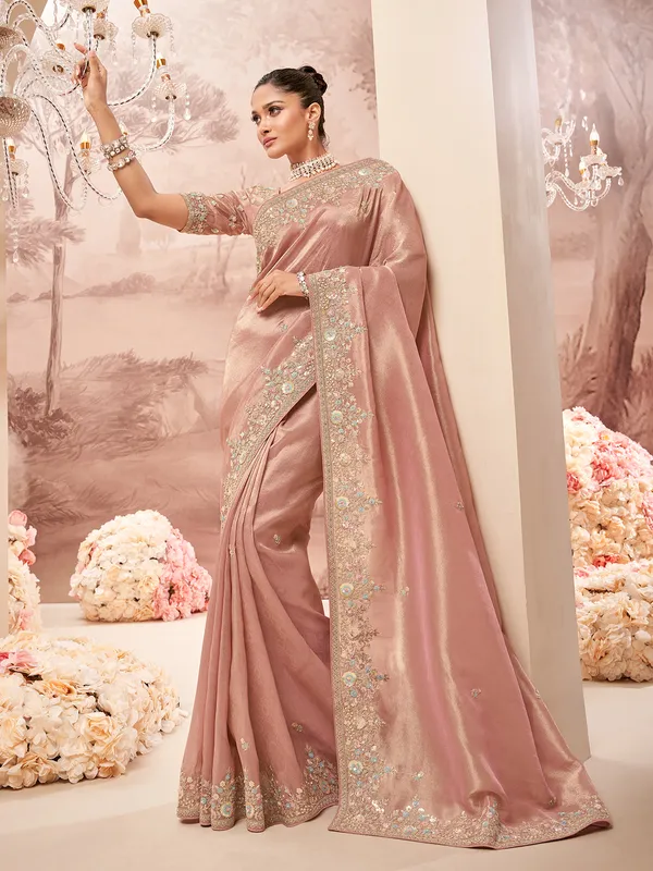 Gorgeous peach tissue silk saree