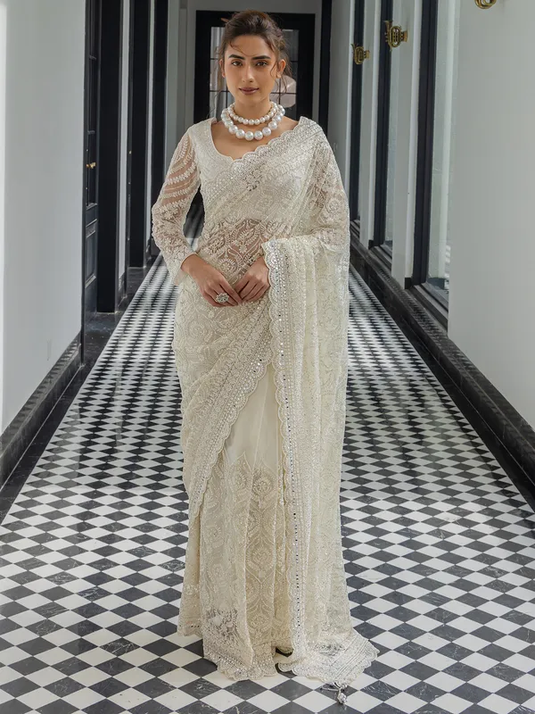 Gorgeous white net saree for wedding