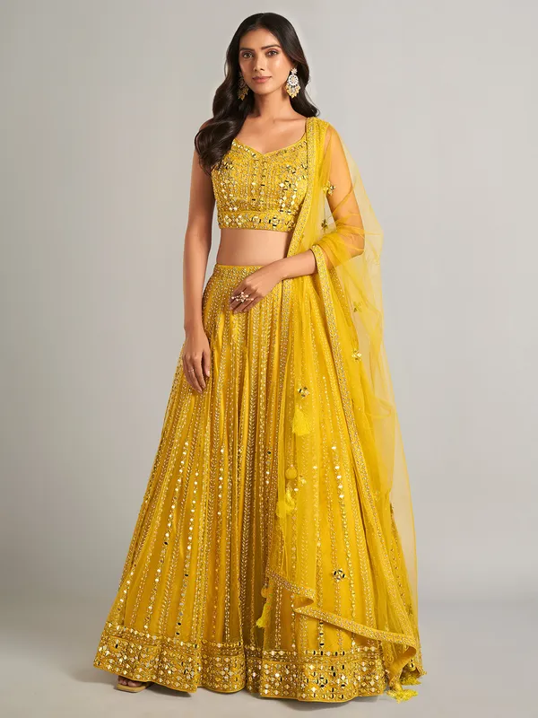 Gorgeous yellow net lehenga choli for party wear