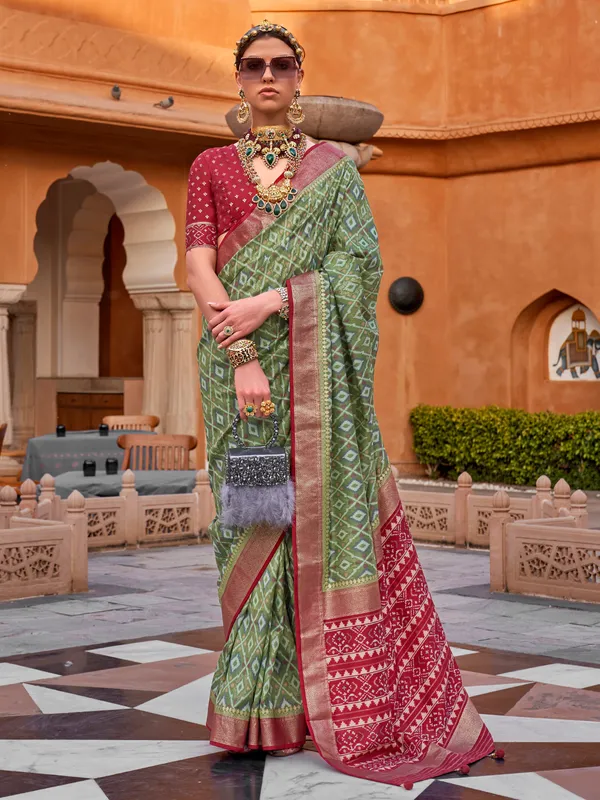 Green cotton silk saree with contrast border