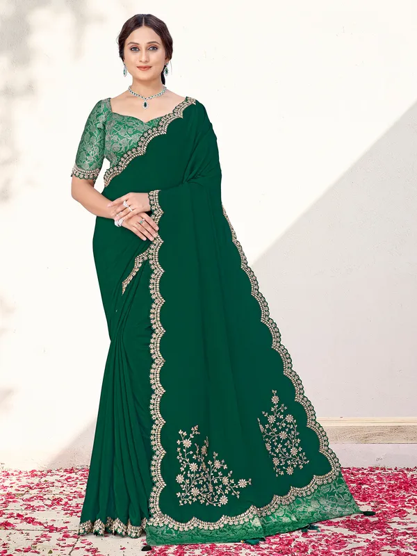 Green crepe saree with stones and resham embroidery