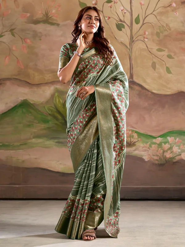Green printed silk saree for festive occasions