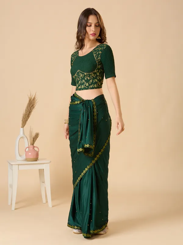 Green round neck lycra ready made blouse with zari work