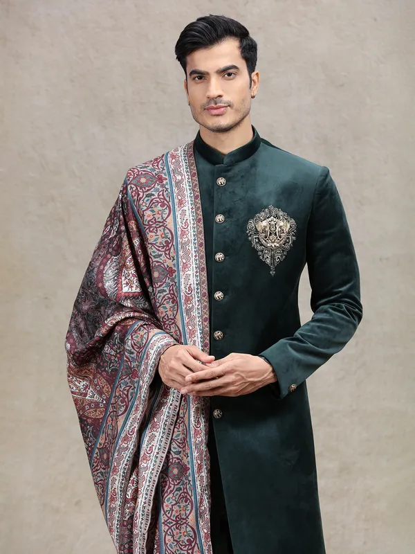 Green royal charming velvet sherwani with elephant patch