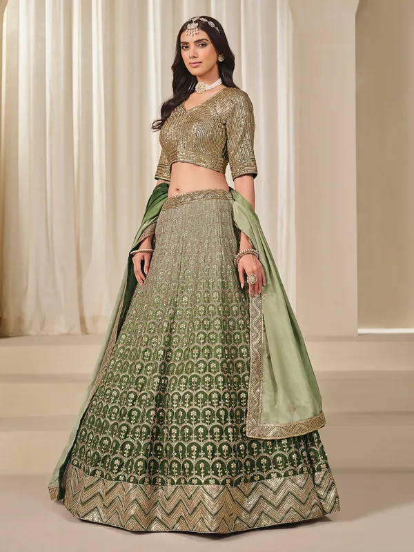 Green sequins worked silk lehenga choli