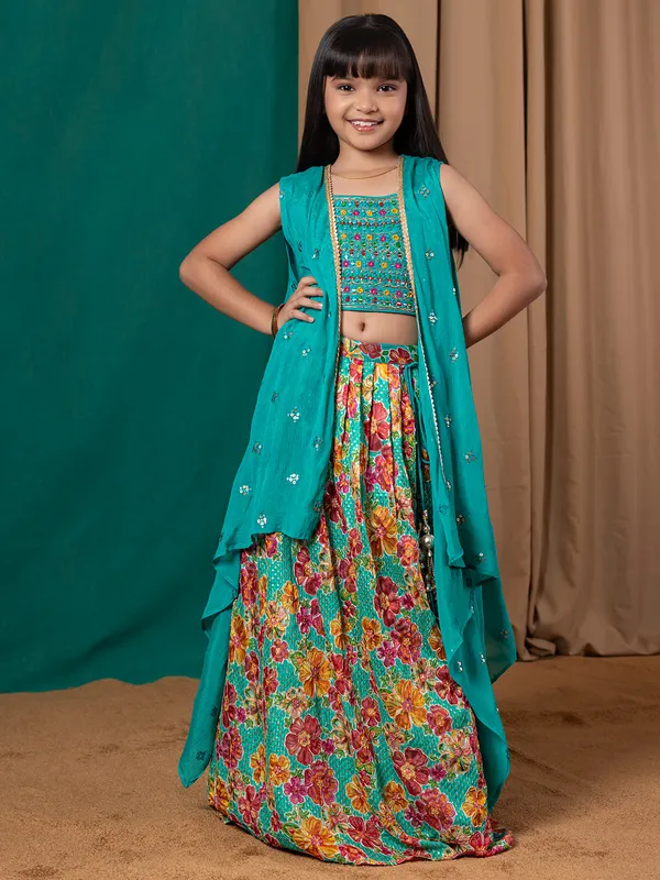 Green silk lehenga choli with gorgeaous shrug