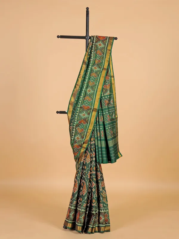 Green silk saree in bandhej print for wedding