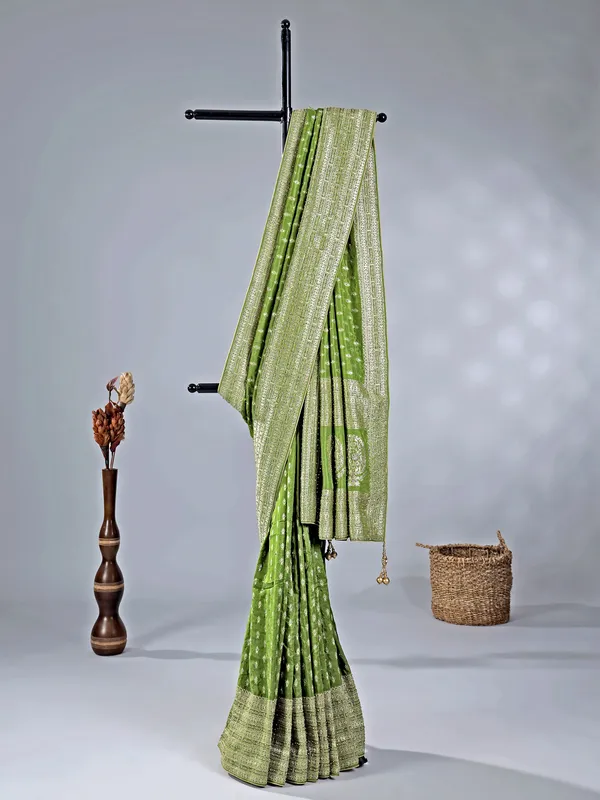 Green silk saree with rich zari motifs