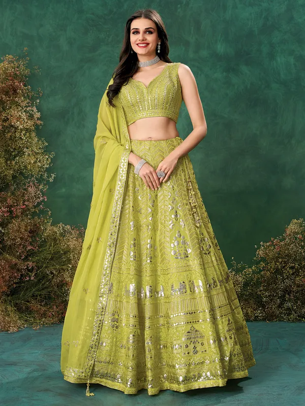 Green wedding wear lehenga choli in soft organza
