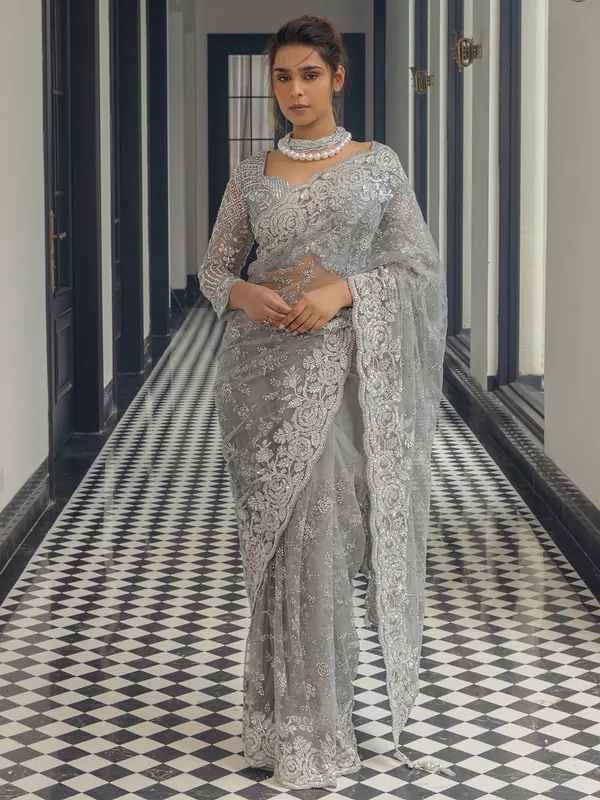 Grey net saree with sequins work