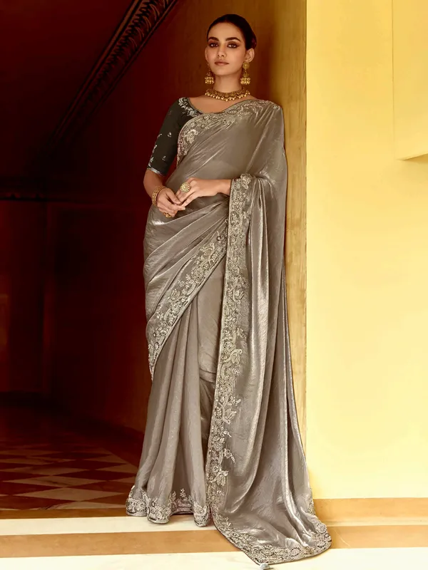 Grey tissue silk saree with sequins work