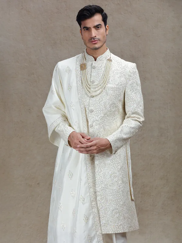 Ivory cream silk sherwani with rich embellishments