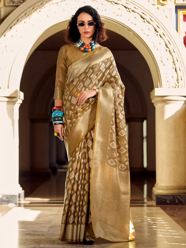 Khaki tissue silk zari worked saree