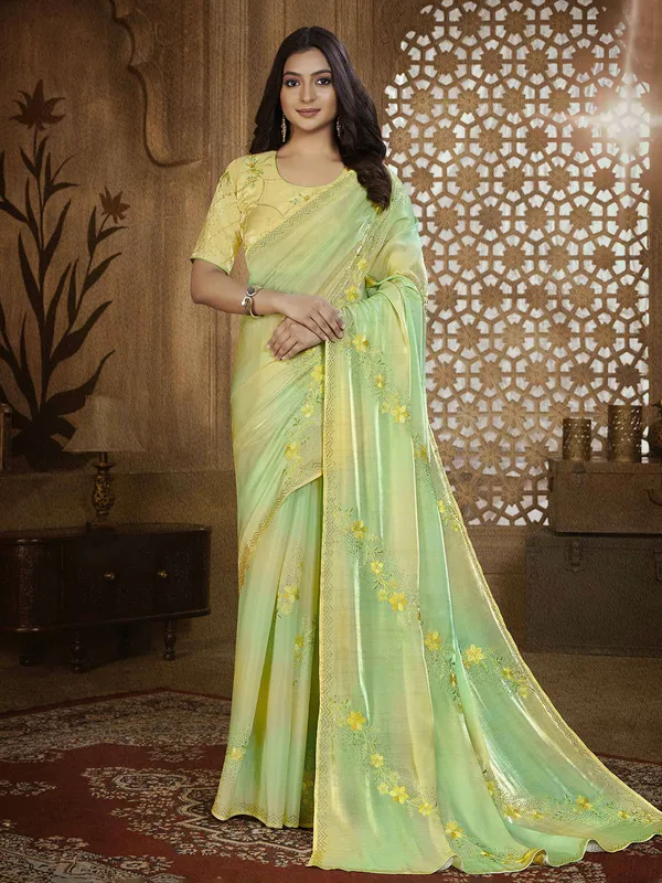 Latest green tissue silk saree