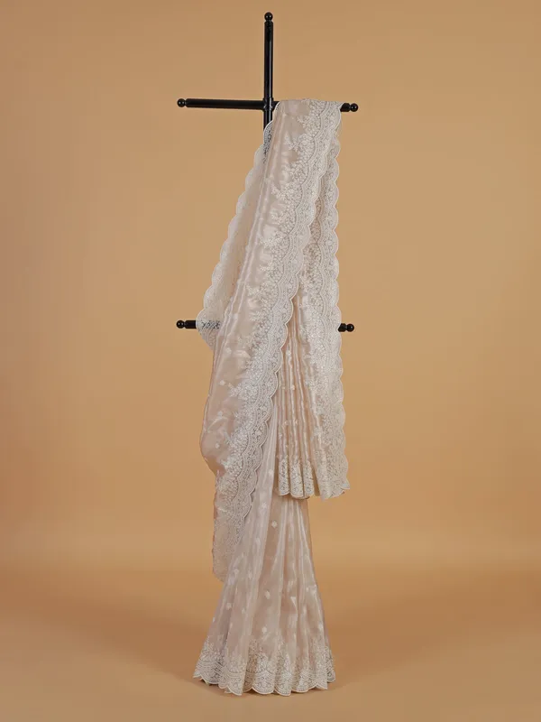 Latest off-white organza saree for festive