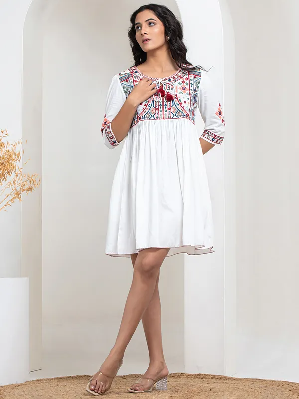 Latest white cotton embroidery kurti