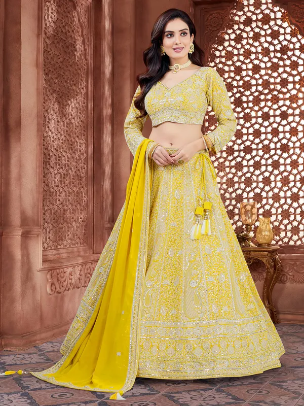 Lemon Yellow georgette lehenga choli with resham work