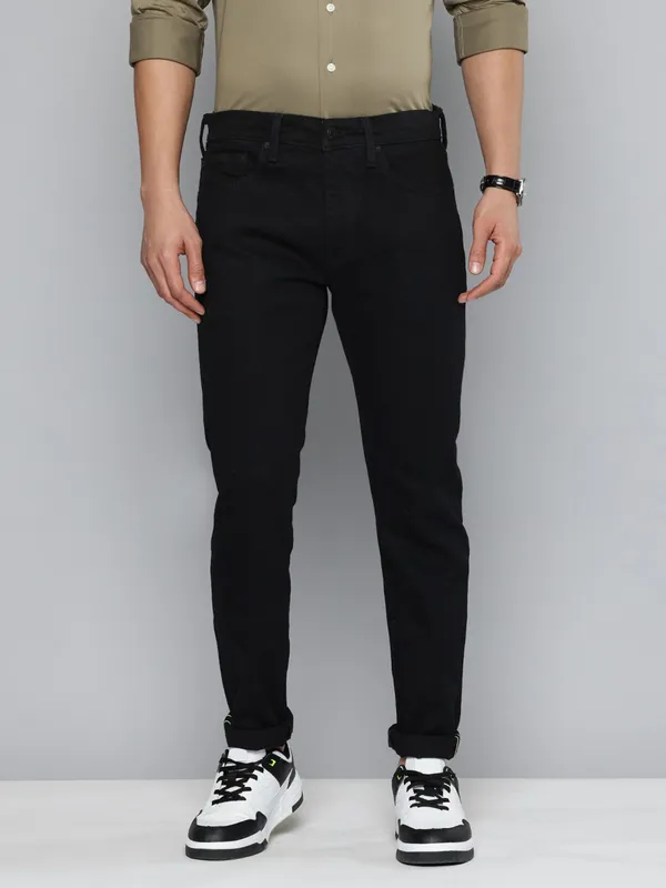 LEVIS solid black slim taper denim jeans for men