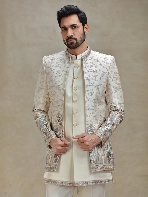 Light beige colourful embroidered layered indo-western