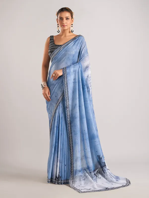Light blue party wear saree with sequins weaving