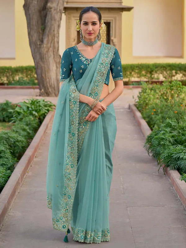 Light blue saree with embroidery border